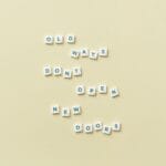 a phrase spelled with scrabble tiles